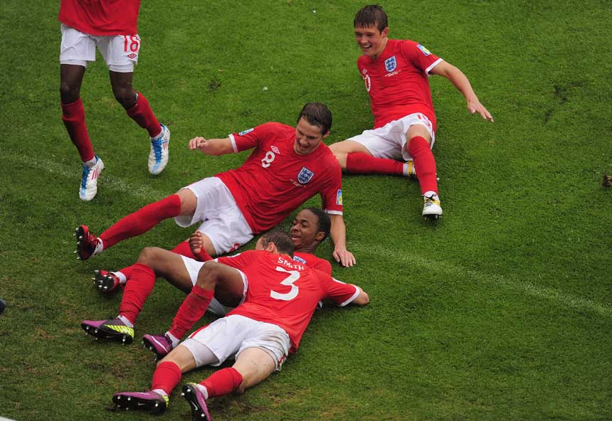 England celebrate their goal against Argentina.